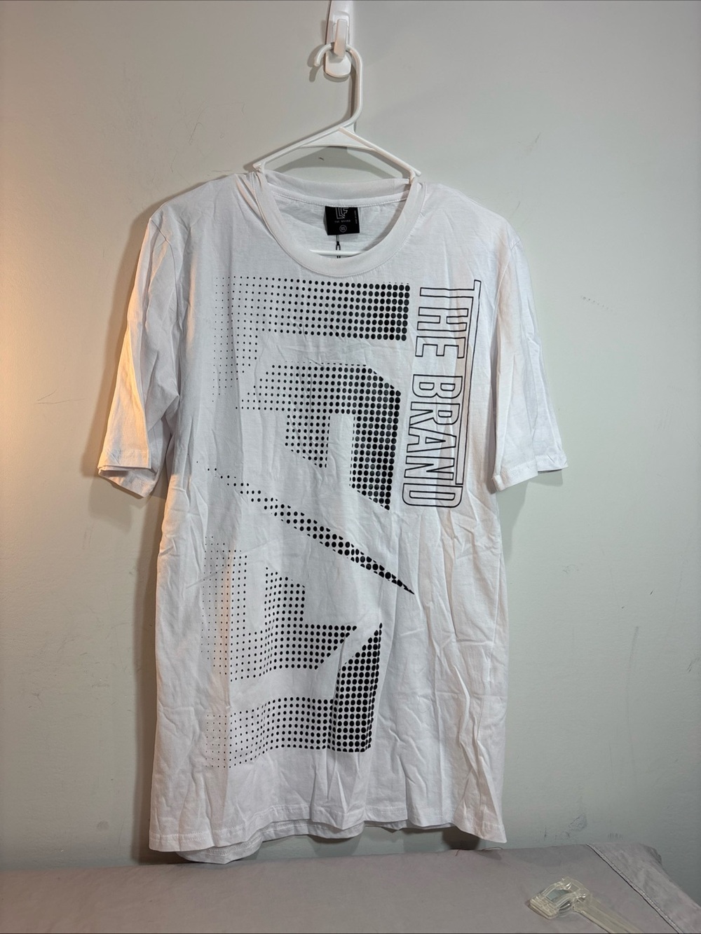 The Brand Men's White Graphic Tee. 778